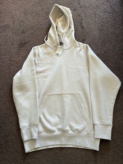 beige sweater