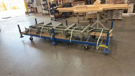Three 10’ x 2’ roller tables