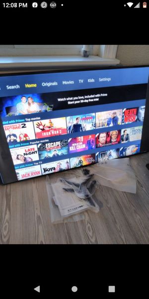 Photo Samsung 65 inch Qled model 60 R comes with everything needed stand remote and owners manual