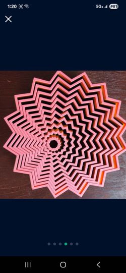 Brand New, 3d printed slinky good quality. 
It's fun to play with!