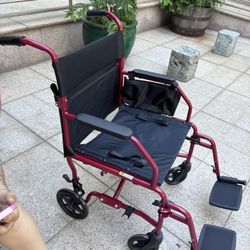 Transport wheelchair