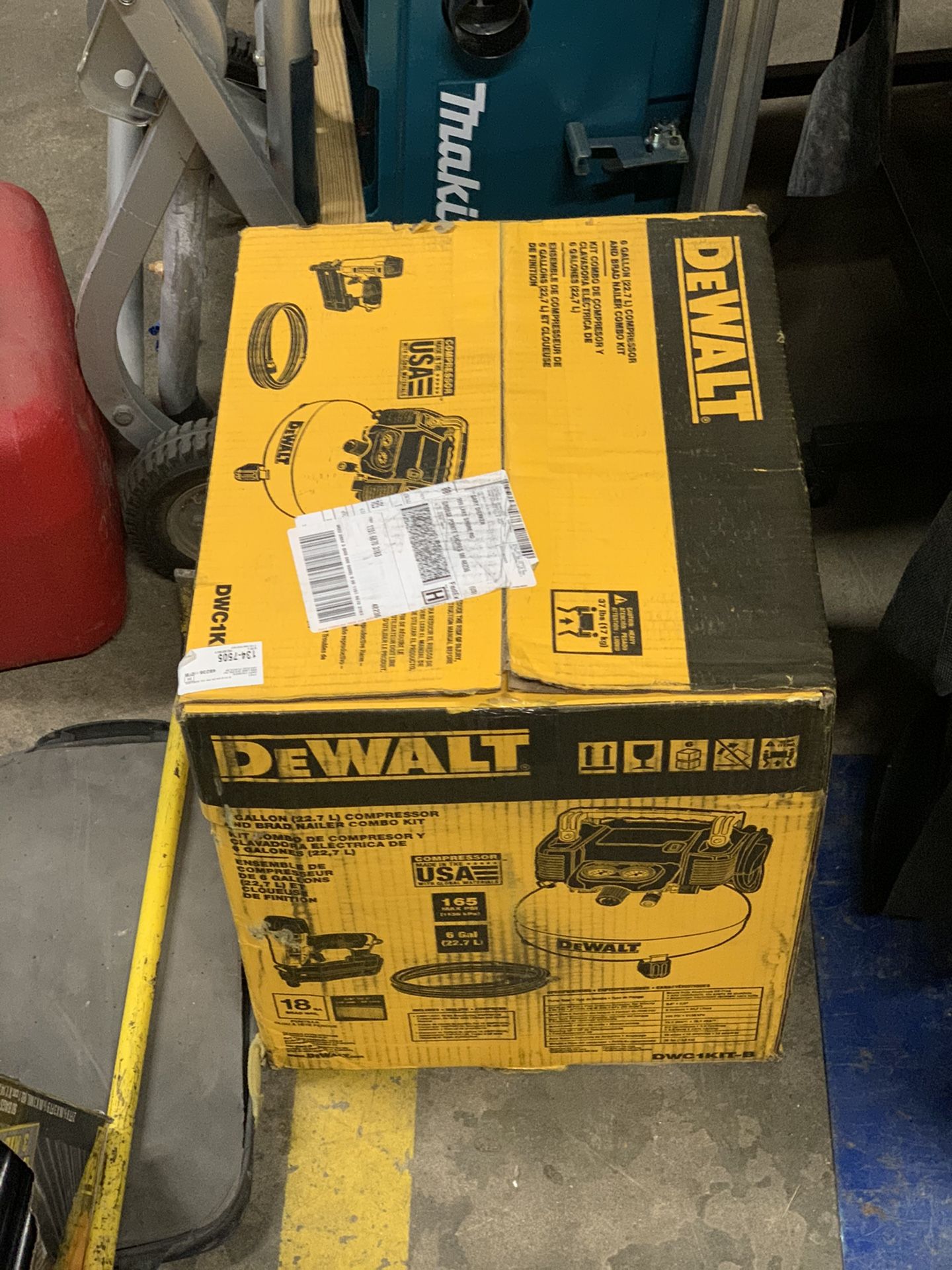 Unopened Dewalt compressor, brad nailer and air hose set