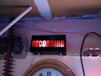Steel construction lighted recording sign