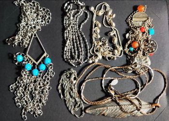 Lot of seven silver tone necklaces