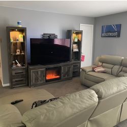 For Sale: Ashley Furniture Electric Fireplace TV Stand with Side Cabinets – $300 (Delivery Available)