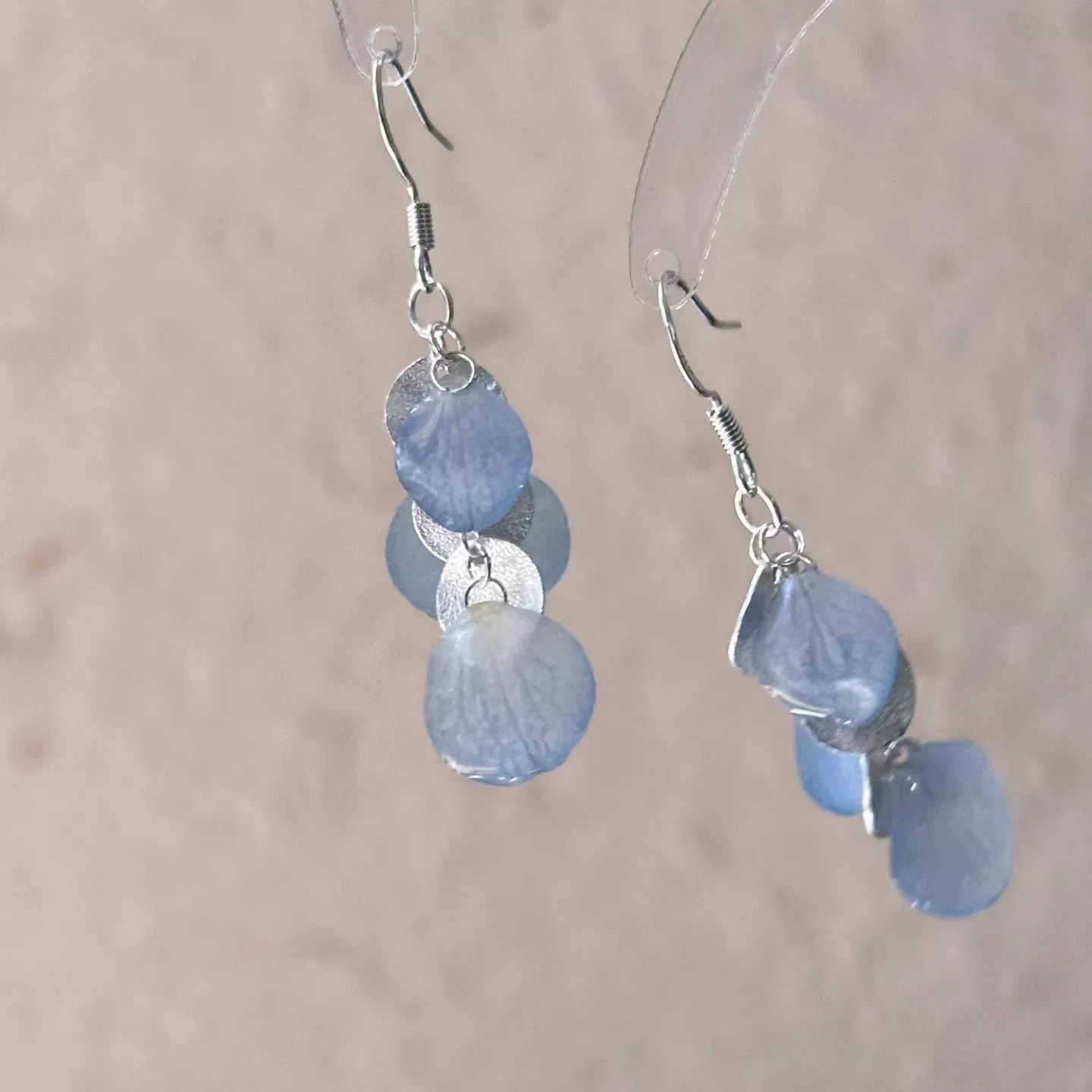 Blue petal imitation shell earrings