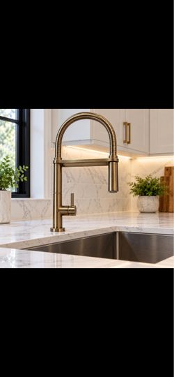 Kitchen Faucet in gold tone