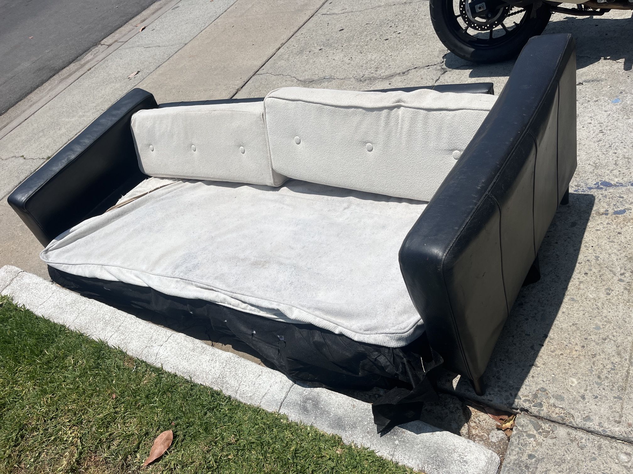 Free IKEA Black Leather Karlstad Couch Frame Only