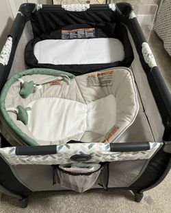 Graco Pack n Play bassinet/changing stations/wheels