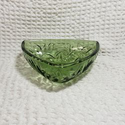Vintage Hazel Atlas glass beautiful green candy dish . Triangular shaped folage design measures 7" T X 7" W X 2 1/2" D . Good condition and smoke free