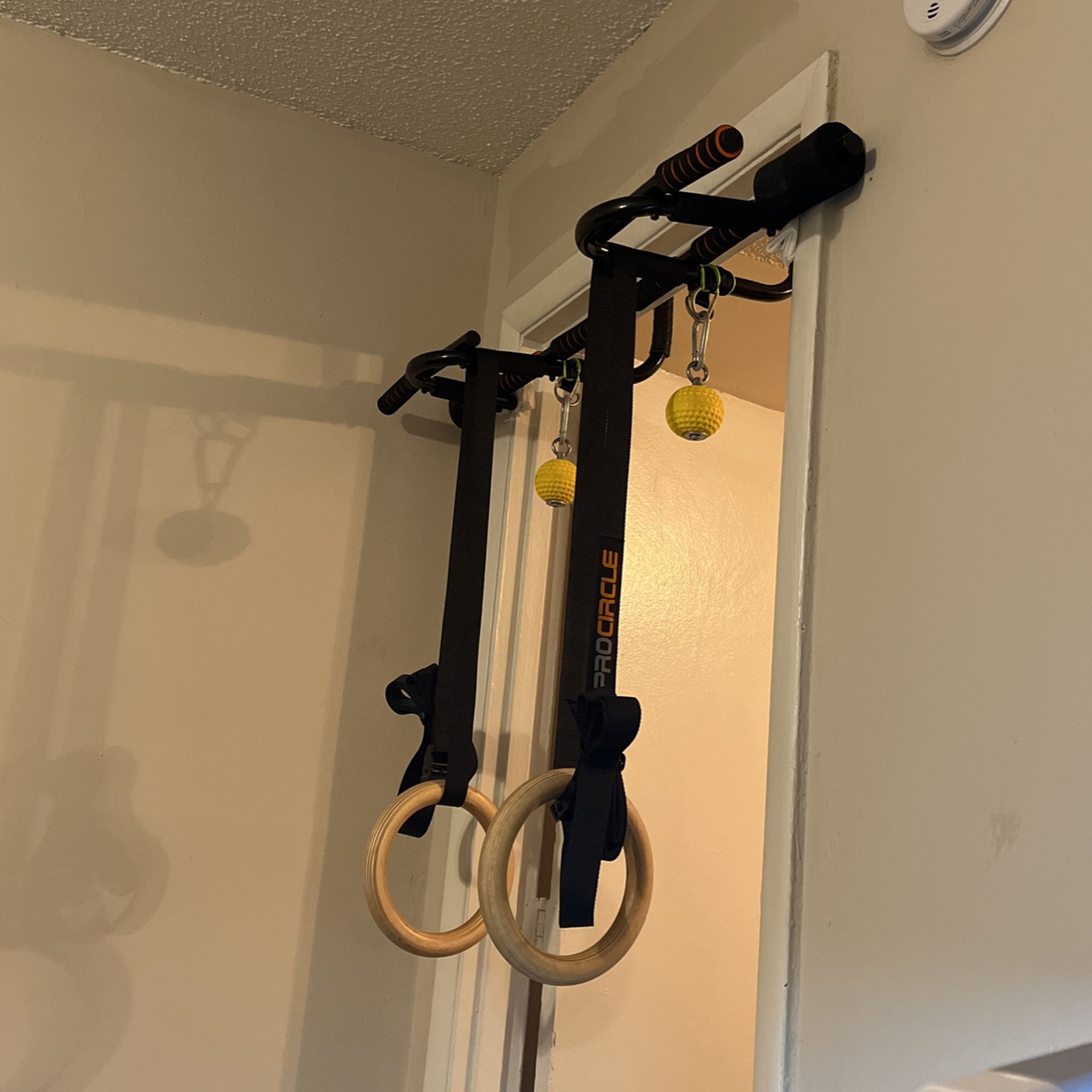 Pull-up bar with a pair of rings 
