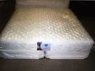 King mattress and box springs $200 for the $700 bed. Must go this week