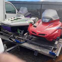 Snowmobile runs and drives very good shape with the trailer all three with the trailer 4000