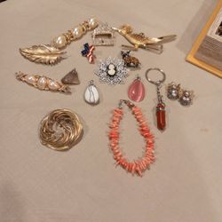 Lot's of Beautiful jewelry from Brooches To Puns And Earrings, Pendants and Bracelet. Must Pick Up