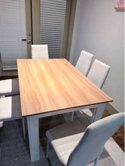 Dining table with 6 chairs and covers