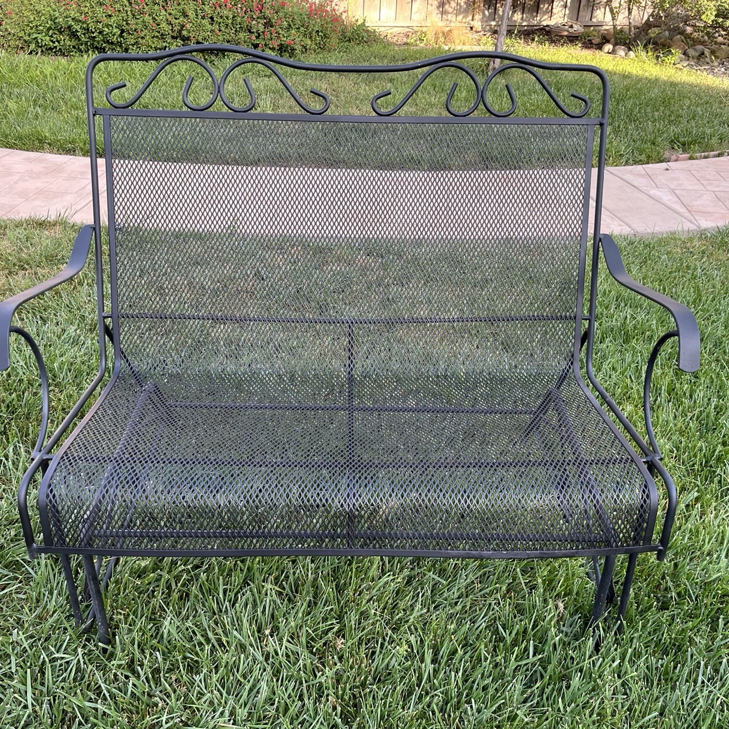 Wrought iron best sale glider swing