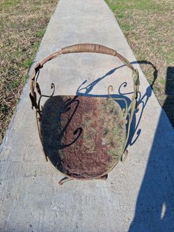 Vintage metal fire holder