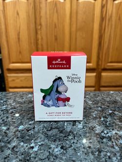 Hallmark 2024 Keepsake Ornament Winnie the Pooh A Gift for Eeyore.  Brand new never opened.  Smoke free home