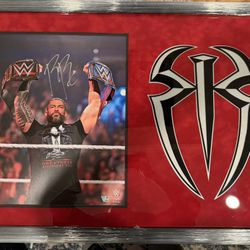 AUTHENTIC Roman Reigns Signed Piece With Double COA’s 
