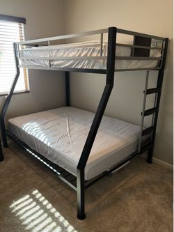 Steel frame bunk bed double, twin beds. 2 years old, hardly used.