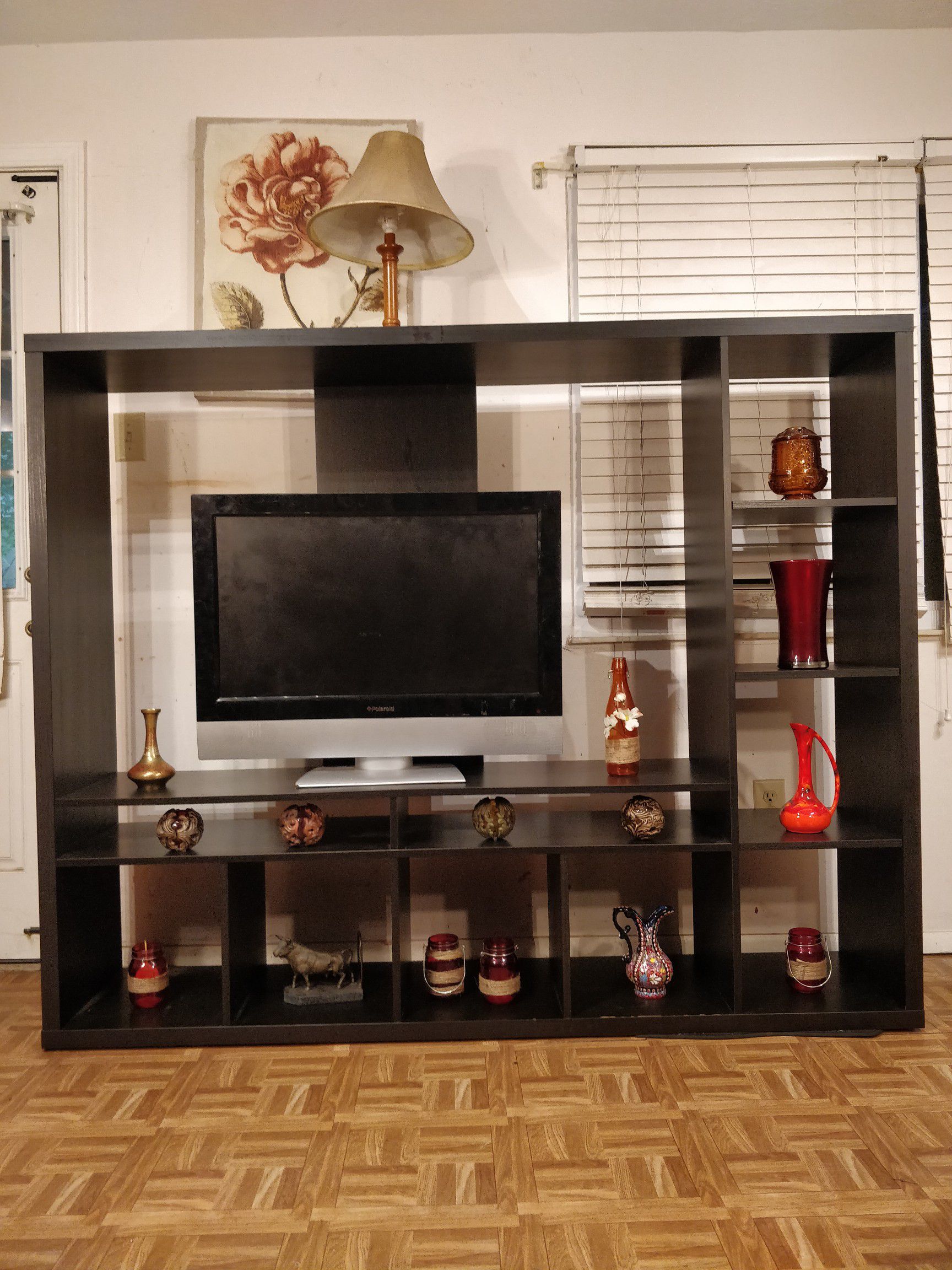 Nice big TV stand for big TVs with shelves in good condition, we can take it apart for easy pickup, Driveway pickup. L72"*W15.5"*H58"