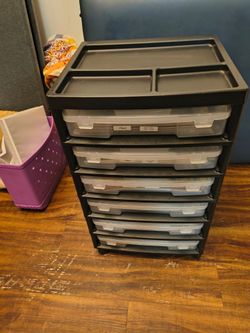Plastic organizer with tons of different art paper