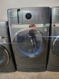 GE 2 AND 1 WASHER AND ELECTRIC DRYER JUMBO WITH WIFI