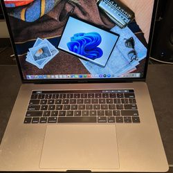 Macbook Pro 2016 15” Retina display And Touchbar 