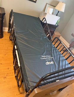 Hospital bed with mattress