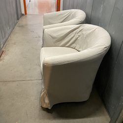 Two Chairs With slip Covers 