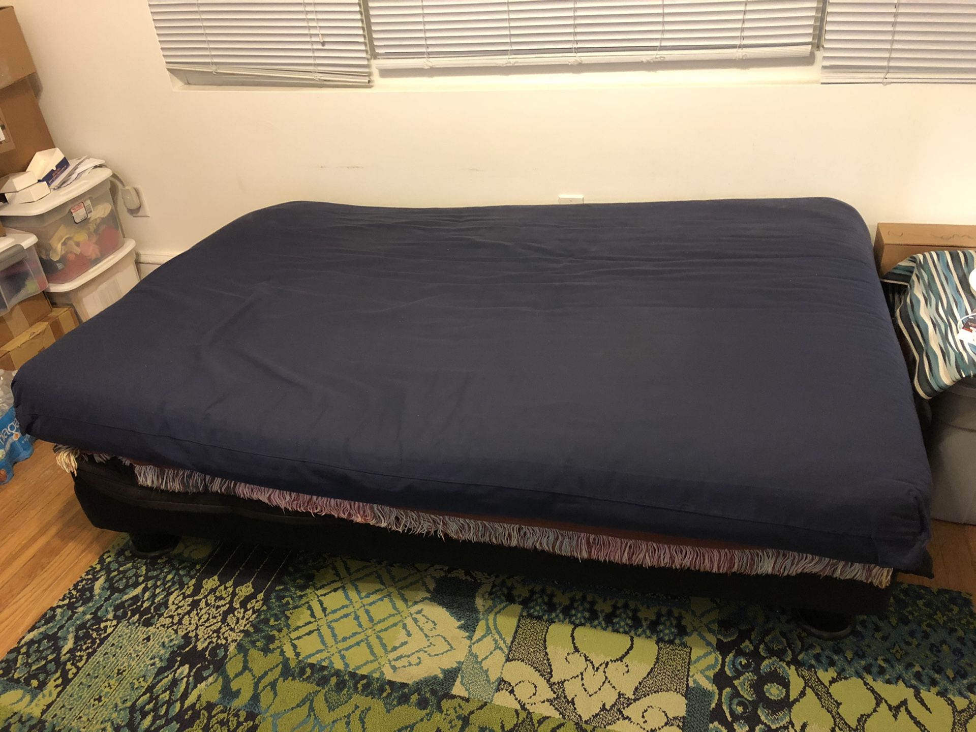 Futon Spring Mattress with blue zip up cover