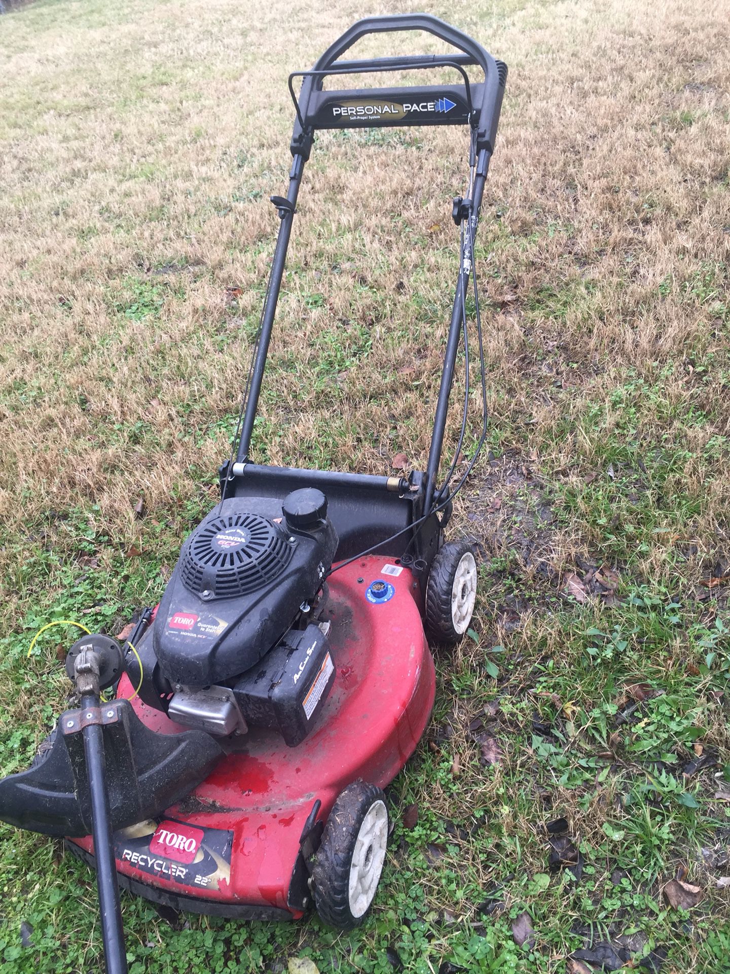 Transmission lawn mower and included weed eater