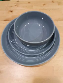 Four place setting of dishes