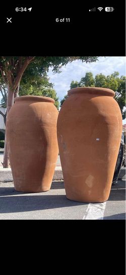 Taller terracotta planters 32”H, 12”ID$115each