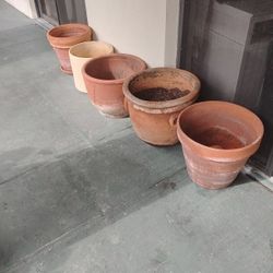 Old Clay Pot And One New Porcelain