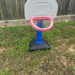 Child, Basketball Goal And Single Exercise Trampoline