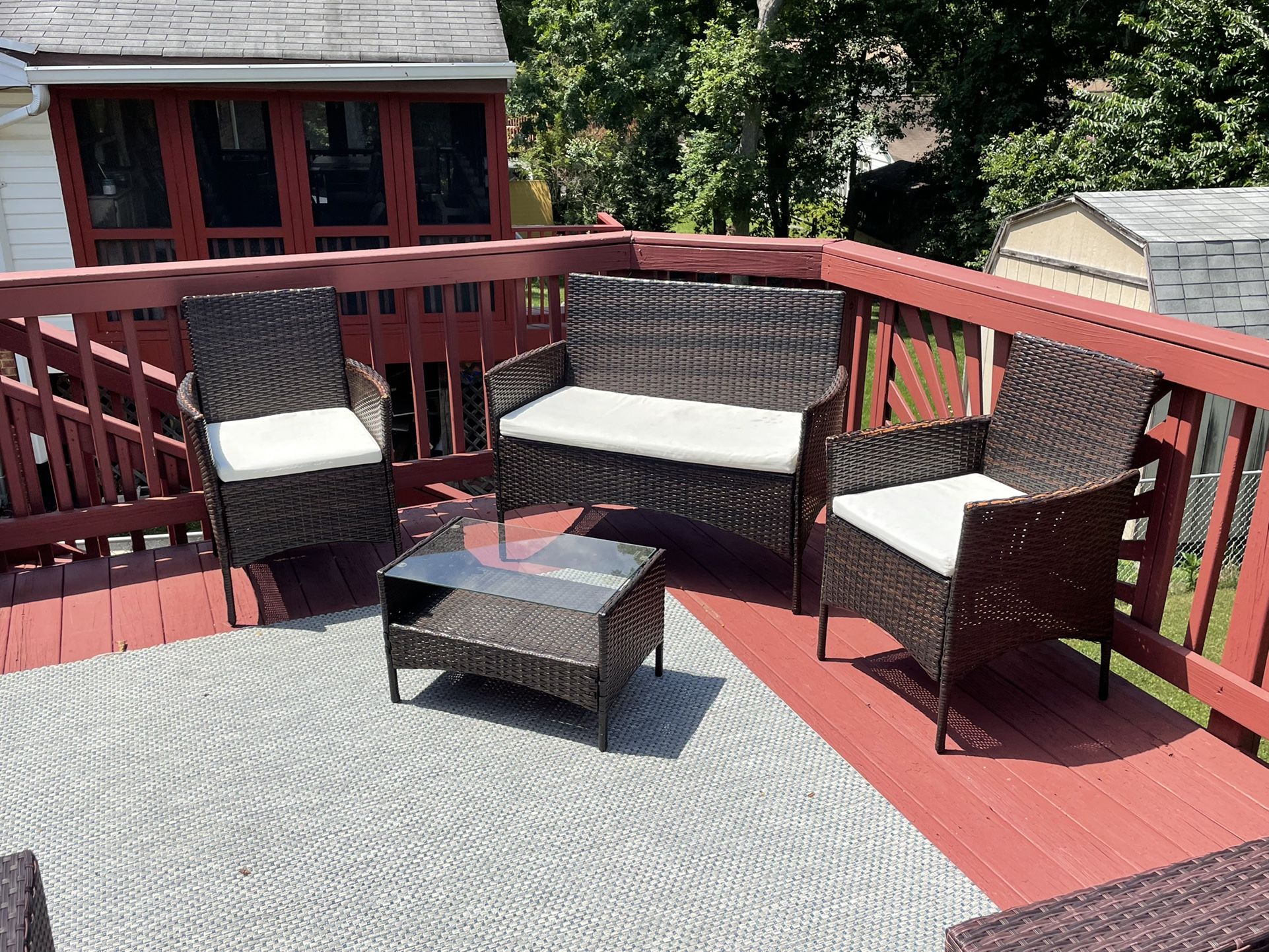 Four piece brown wicker patio set