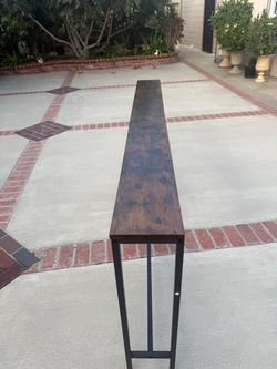 Long and narrow table 80 Inches long by eight Inches wide