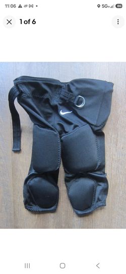 Boys NIKE PADDED FOOTBALL PADS w/ Belt Swish logo Size XL Compression Great!