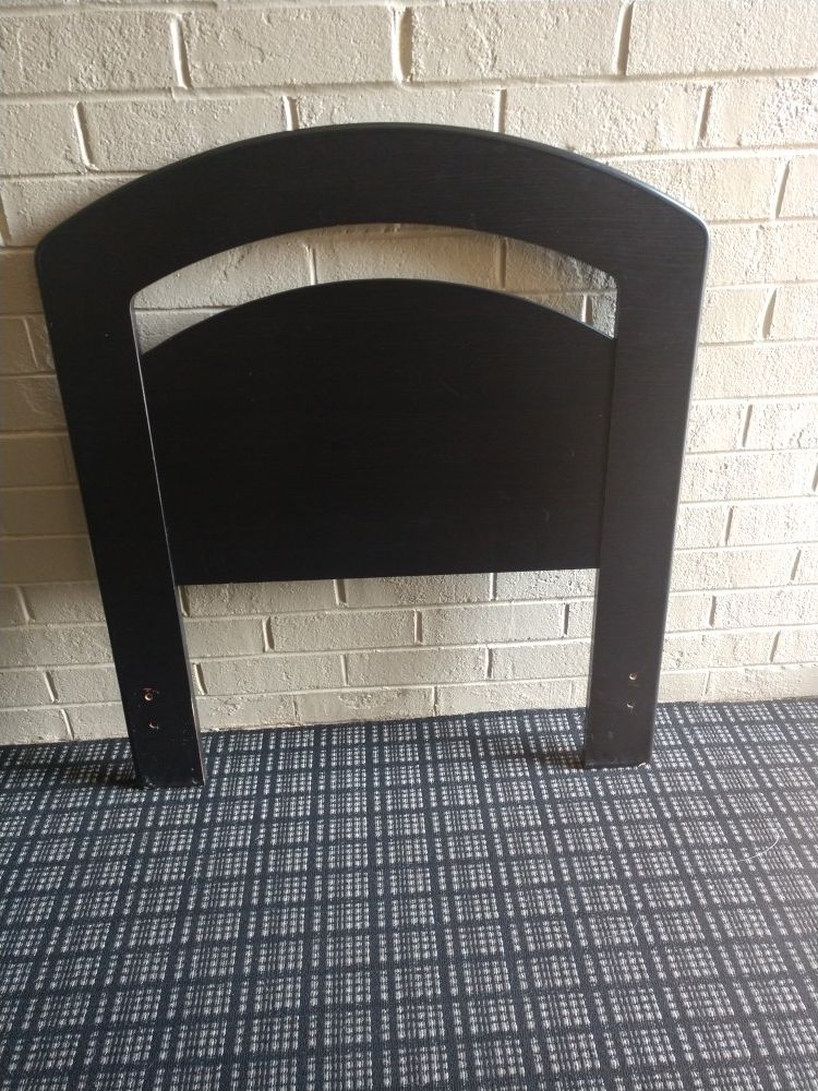 Simple black wood twin headboard