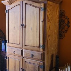 Sold Wooden Armoire With 40 Inch Samsung T.v.