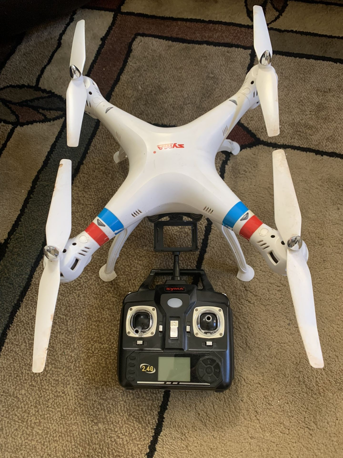 SYMA Quad Copter (Comes With GoPro Mount) If Listing Is Up It Is Available