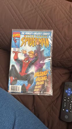 Selling a Spider-Man comic still in good condition plastic is kinda open the bottom the book itself is in great shape