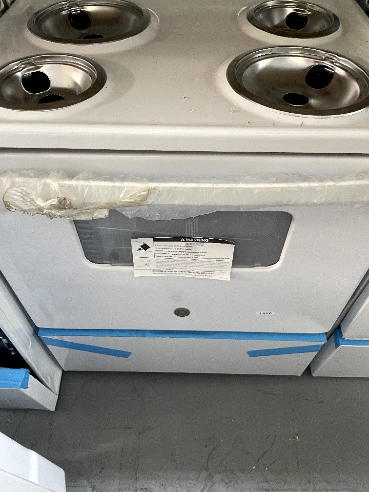 GE 30” electric stove with coils white DENTED 225 for Sale in Medley