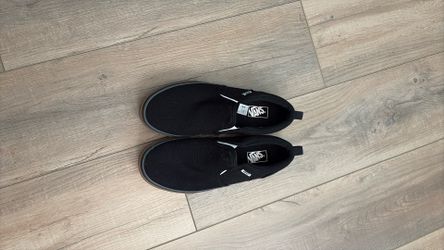Black vans slip on