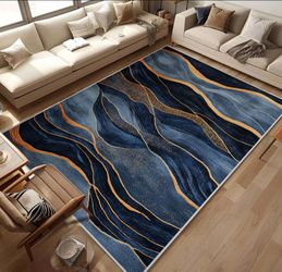 5x7 blue and gold abstract wave area rug