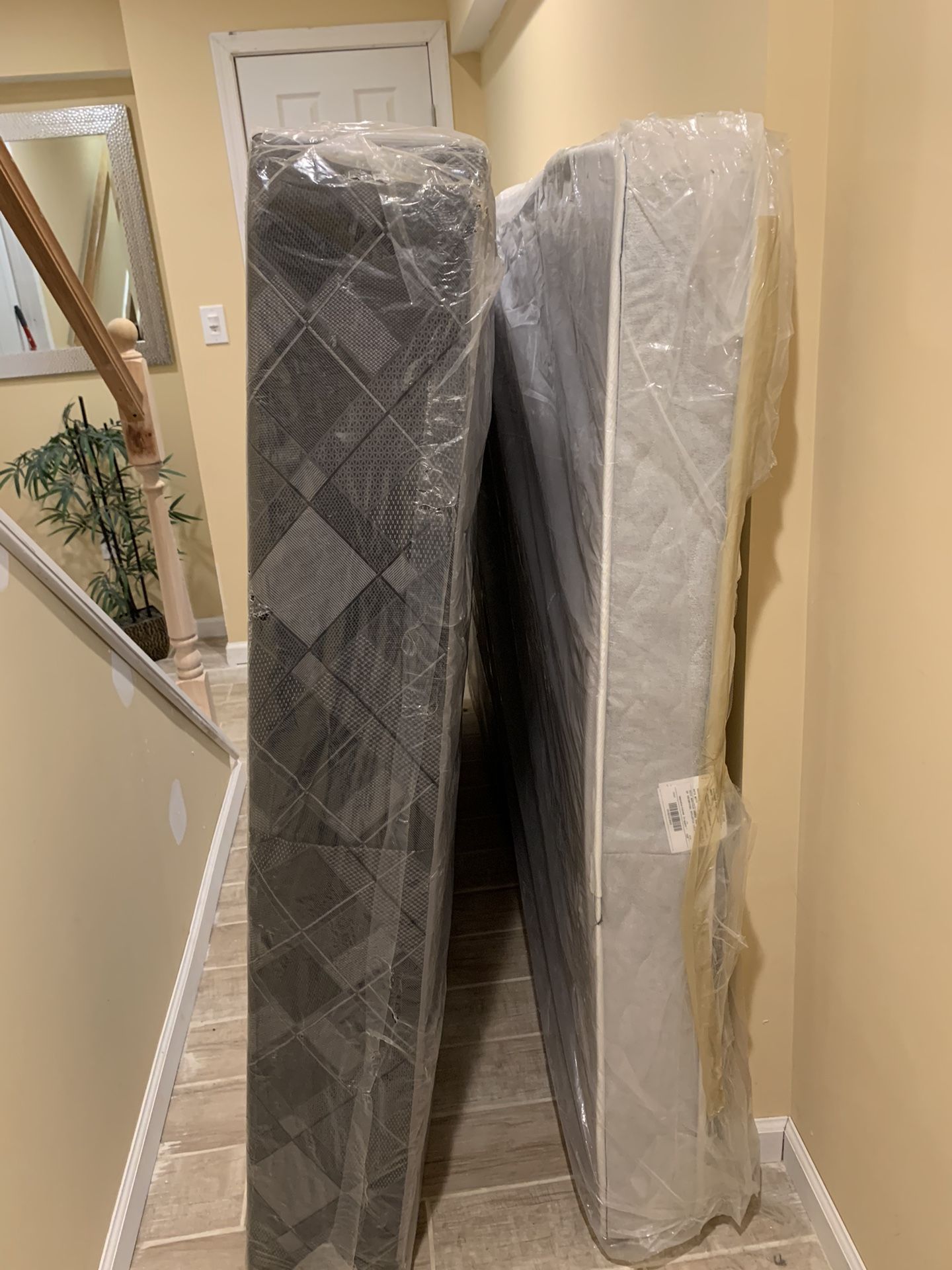 Brand new queen size gray mattress with a base.