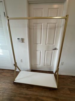 NEW WHEELED GOLD CLOTHING RACK