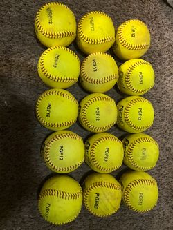 $60  - Lot of 15 used softballs
