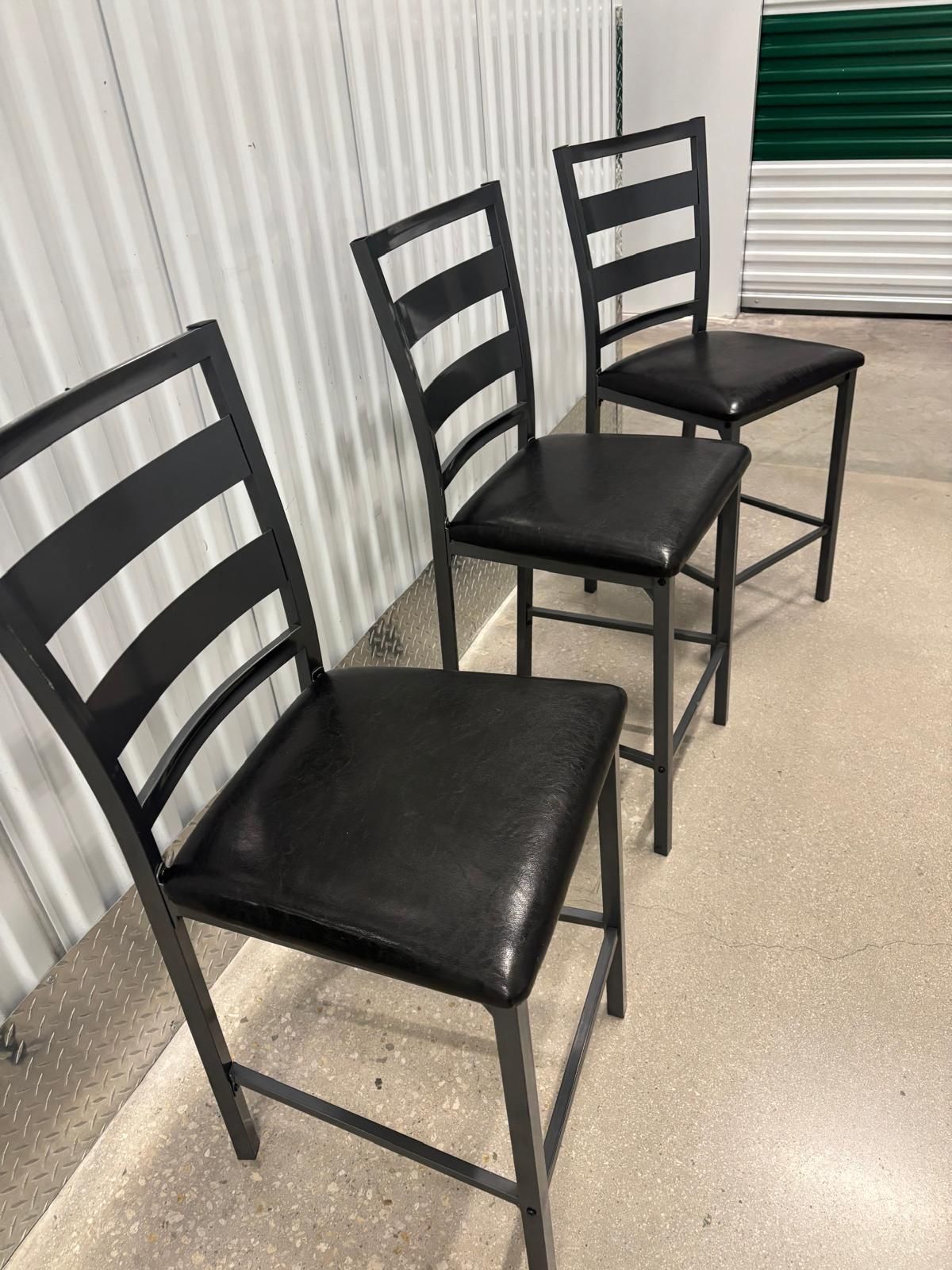 Three metal and leather top chairs … 18” wide , 17” depth , 24” high to seat , 40” high to back $20 each